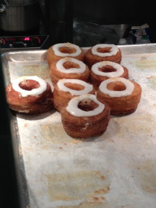 A tray of cronuts waits to be devoured.